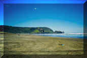 South Piha (behind Lion Rock) from North Piha (35661 bytes)